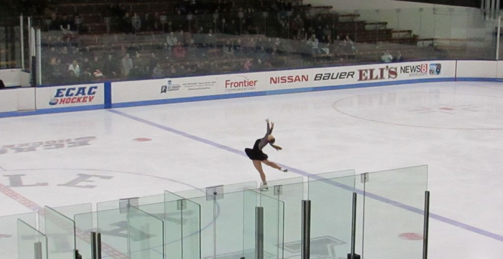 A Yale figure skater twirls on ice. 